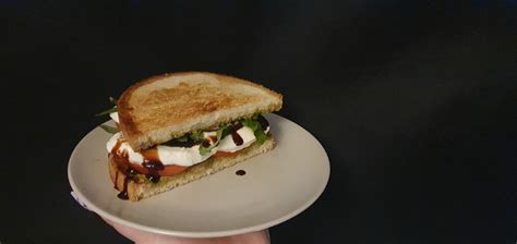 Pesto On Toast With Mozzerella Tomatoes Balsamic And Fresh Basil R