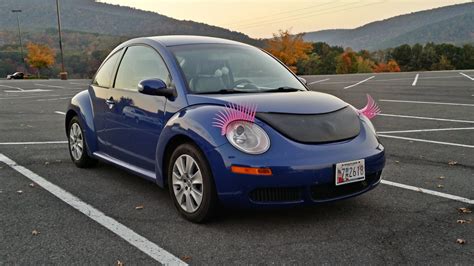 Pink Volkswagen Beetle Convertible With Eyelashes