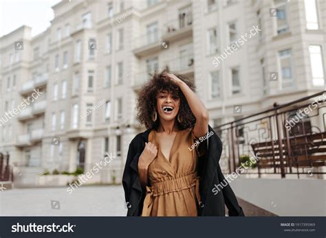Excited Brunette African Woman Rejoices Outside Stock Photo 1917395969 Shutterstock