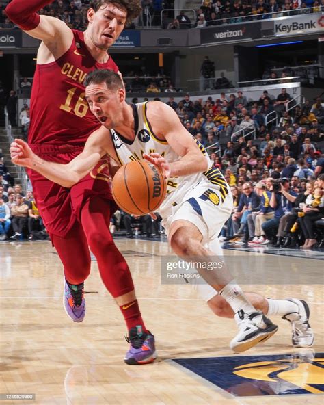 T J Mcconnell Of The Indiana Pacers Drives To The Basket During The