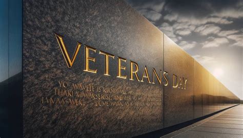 The Words Veterans Day Are Etched Solemnly Into A Granite Memorial