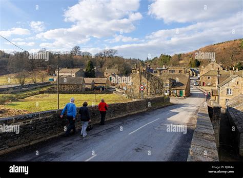Visitors Crossing The Beldon Burnriver Derwent Bridge Into The