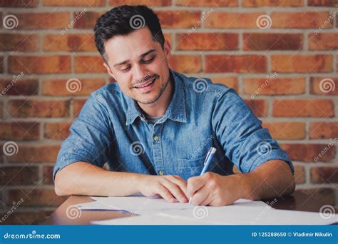 Handsome Man Writing Something Stock Photo Image Of Person Adult