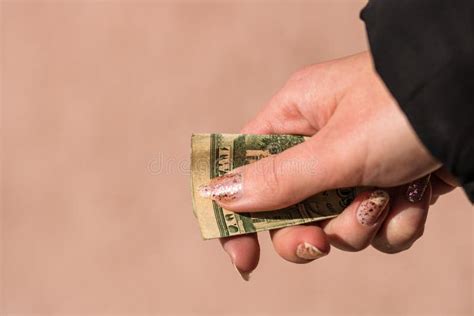 Hands Giving Money Like A Bribe Or Tips Holding Us Dollars Banknotes