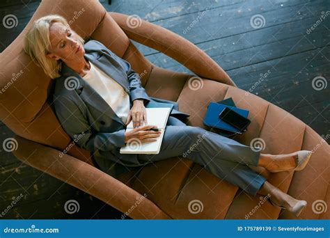 Exhausted Businesswoman Lying In Chair Stock Image Image Of Holding