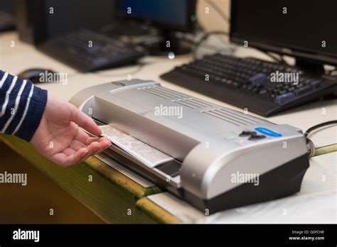 Person In Laminating A Pictorial Expression Stock Photo Alamy