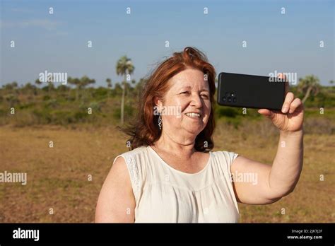 Latin Mature Woman Making A Selfie With Her Phone In El Palmar National Park Entre Rios