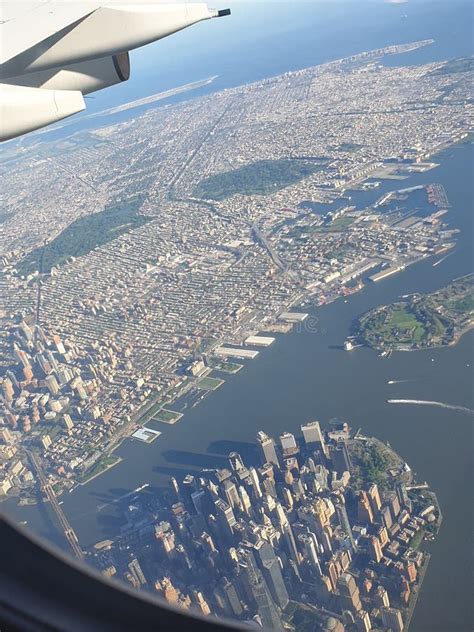 Vertical Aerial View of the New York City Skyline from an Airplane Window Stock Image - Image of ...