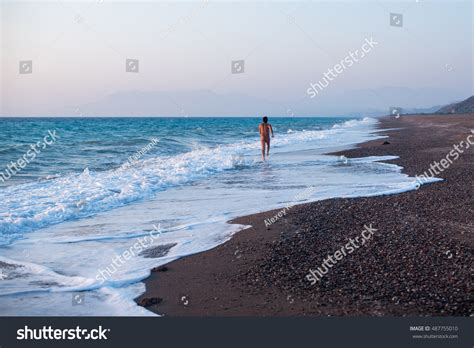 Naked Man Running On Beach Stock Photo Shutterstock