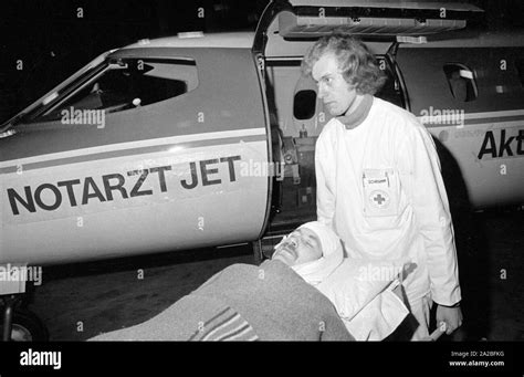 A seriously injured patient is transported with a medical emergency jet ...