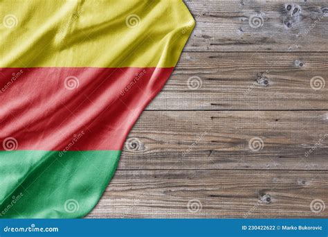 Kurdistan Flag On Concrete Wall Banner With Fabric Texture Of The Flag