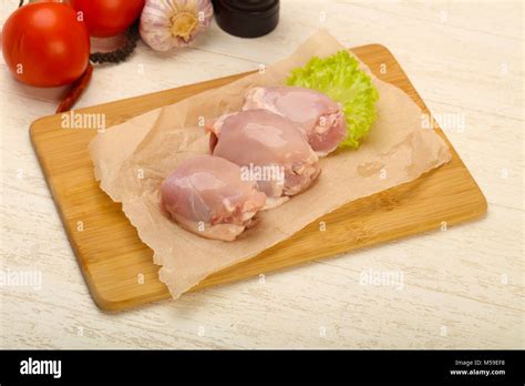 Boneless Raw Chicken Thighs Ready For Cooking Stock Photo Alamy