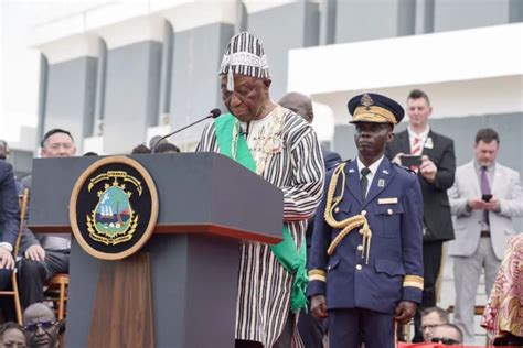 Liberia President Boakai helped off podium after failing to complete ...