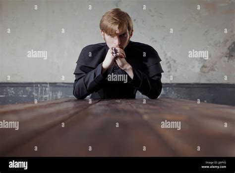 Portrait Of Handsome Young Catholic Priest Looking At You Prayer Stock