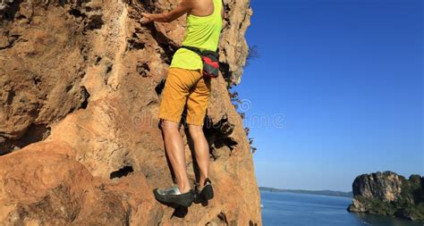 Rock Climber Climbing At Seaside Cliff Stock Image Image Of Lead