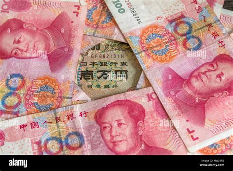 Banknotes Of Rmb And Yen Arranged For Photography Stock Photo Alamy