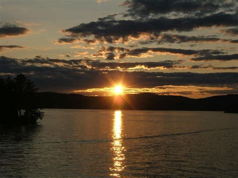 Lake Winnipesaukee In New Hampshire A Beautiful Sunset Over The Lake