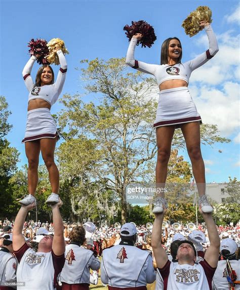 The Florida State University Cheerleaders Perform At A Battle Of The