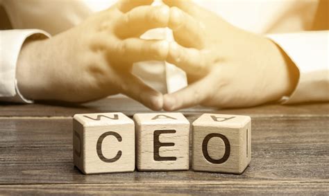 Wooden Blocks With The Word Ceo And Businessman Chief Executive Officer