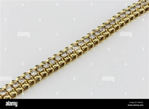 Gold Diamond Bracelet Stock Photo - Alamy