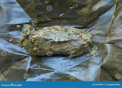 Traditional Steamed Dish Made From Cassava Leaves Wrapped In Banana