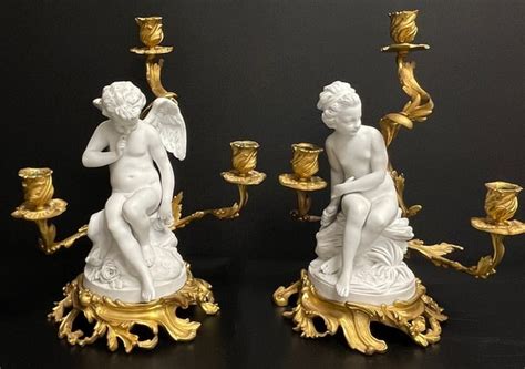 Pair Sevres Bisque Nude Figures With Bronze Candlesticks In United