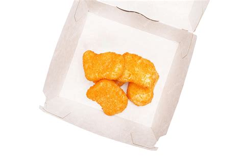 Premium Photo Fried Chicken Nuggets In A Cardboard Package On A White Isolated Background