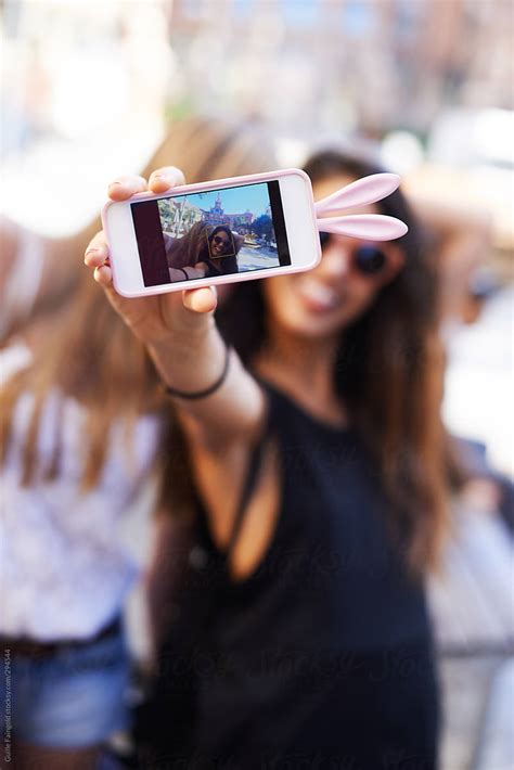 Girls Taking Selfie With Phone By Stocksy Contributor Guille