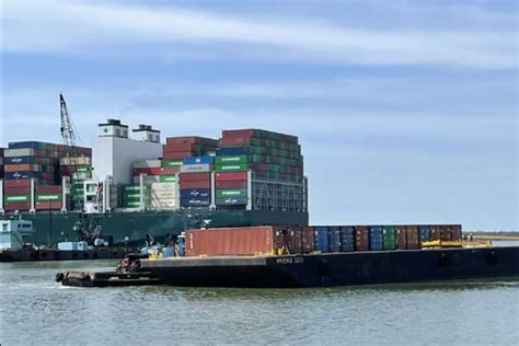 Containers Being Offloaded From Ever Forward Ships And Ports