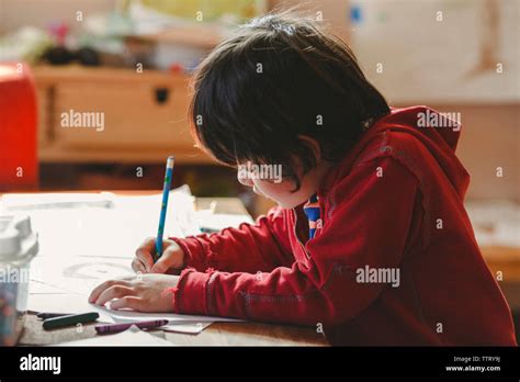 Boy Holding Up Drawing Hi Res Stock Photography And Images Alamy
