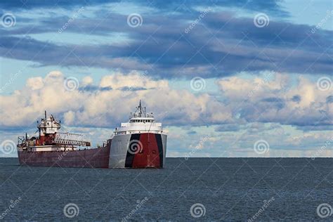 A Freighter Ship on Lake Superior Stock Photo - Image of clouds, iron ...