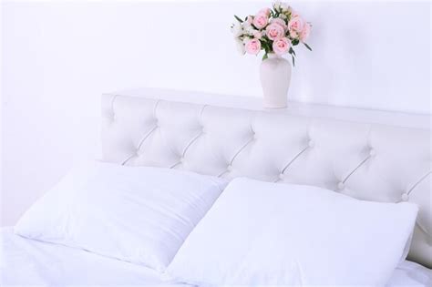 Premium Photo Comfortable Soft Bed In Room