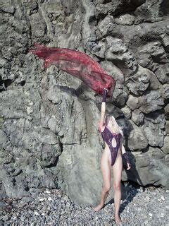Gorgeous Blonde Chick Nika N Is Demonstrating Her Hot Body Shape Under The Waterfall And Getting