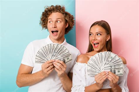 Premium Photo Excited Young Couple Standing