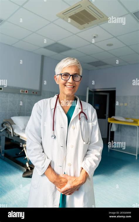 Portrait Of A Smiling Medical Mature Doctor Woman With Stethoscope