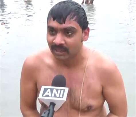 Devotees Take Holy Dip At Ayodhyas Saryu Ghat On The Occasion Of Makar