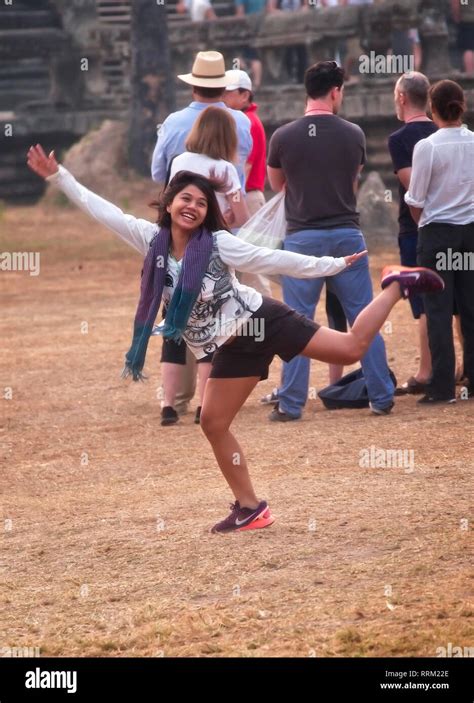 Happy girl dancing Stock Photo - Alamy