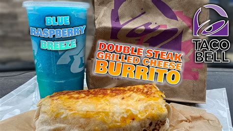 Taco Bell Double Steak Grilled Cheese Burrito And Blue Raspberry Breeze Review Youtube