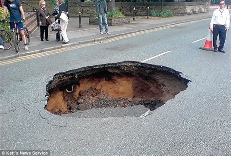 Going Going Gone How A Giant Pothole Appears In The Road In Matter