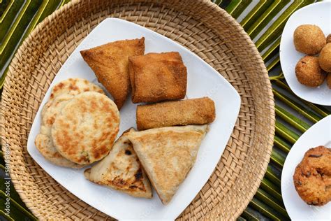 Authentic Sri Lankan different street food, short eats. Vegetable roti, coconut roti, cutlets ...