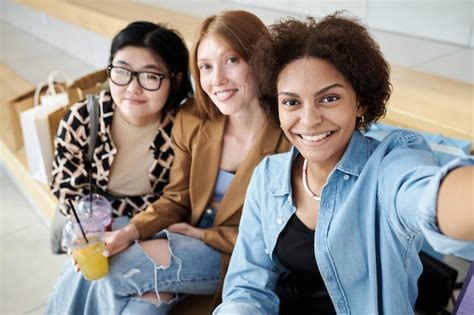 Premium Photo Multiracial Group Of Friends Taking Selfie Together