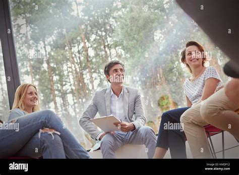 Smiling People Talking In Group Therapy Session Stock Photo Alamy