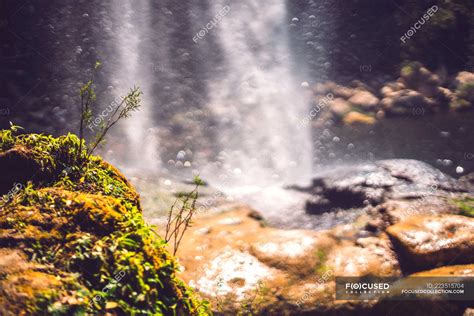 breathtaking view  thin stream  water falling  cliff