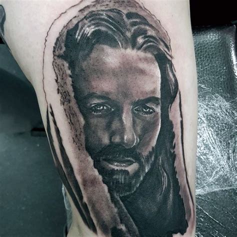 Religious style black and white thigh tattoo of Jesus portrait ...