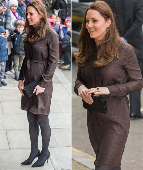 Duchess Of Cambridge Covers Baby Bump As She Celebrates Work Of