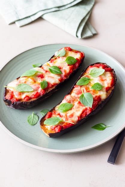 Premium Photo Baked Eggplant With Cheese Mozzarella Tomatoes And