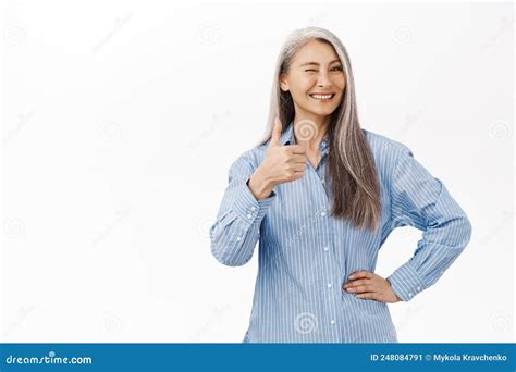 Cheerful Asian Senior Woman Japanese Granny Showing Thumbs Up In