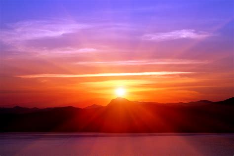 sunset over mountains near sea by macinivnw on DeviantArt