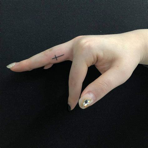 Cross finger tattoo ideas photos