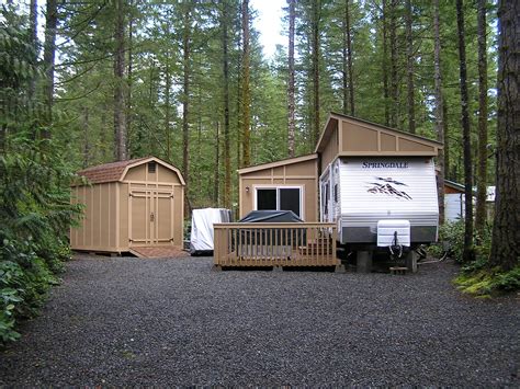 There Are Two Small Houses In The Woods